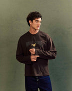 Avelle Studios long sleeve tee in brown, side portrait